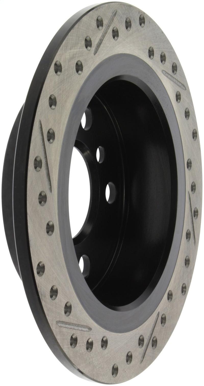 StopTech 14-15 Mini Cooper Base Slotted & Drilled Rear Left Rotor - Torque Motorsport