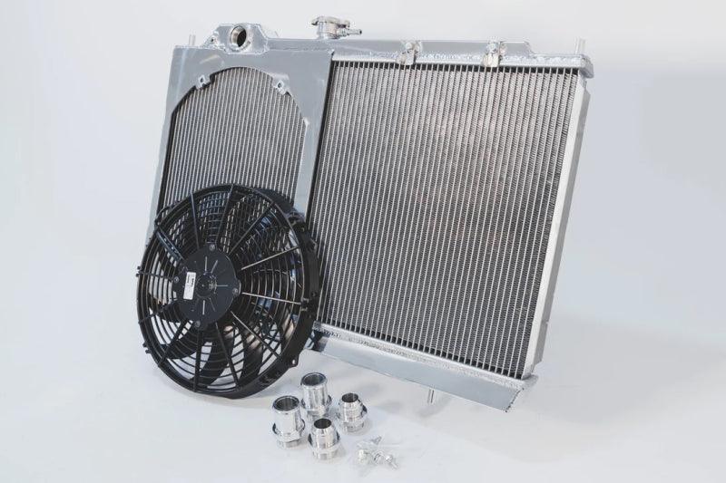 CSF 96-07 Mitsubishi Evo 4/5/6/7/8/9 Full-Slim Radiator w/12in Fan & Shroud/-16AN & Slip On Fitting - Torque Motorsport