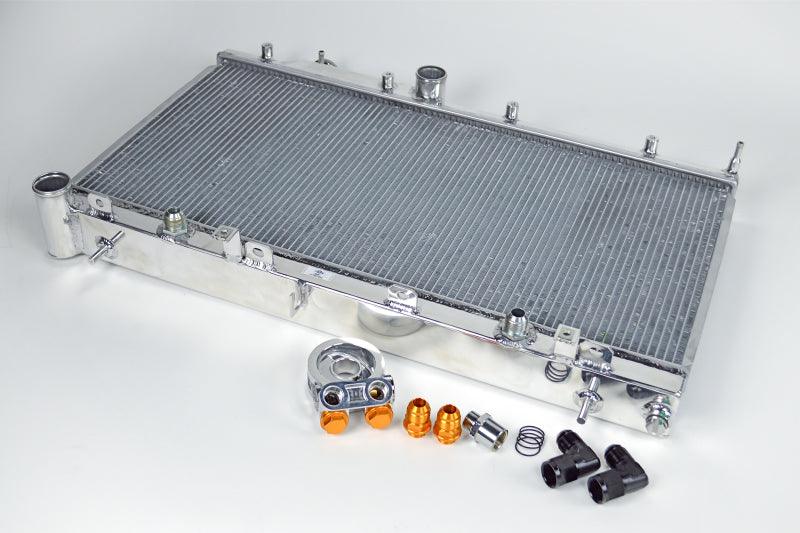 CSF 08-15 Subaru WRX/STI 2-Row Radiator w/Built-In Oil Cooler - Torque Motorsport